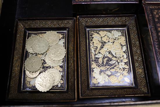 A Chinese export lacquer counter box with sixty six mother of pearl fish bezique markers